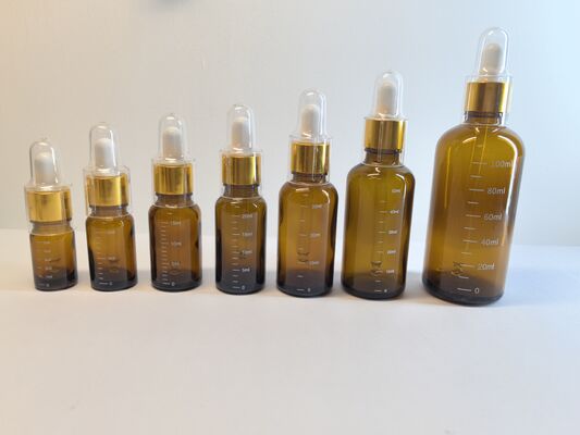 Premium Customizable Glass Essential Oil Bottles | 5ml-100ml Dropper Bottles with Multi-Material Caps & Scale Options