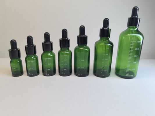 Premium Customizable Glass Essential Oil Bottles | 5ml-100ml Dropper Bottles with Multi-Material Caps & Scale Options