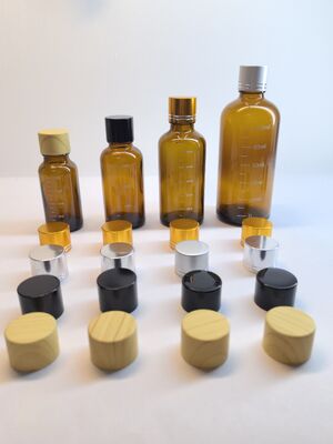 Premium Customizable Glass Essential Oil Bottles | 5ml-100ml Dropper Bottles with Multi-Material Caps & Scale Options