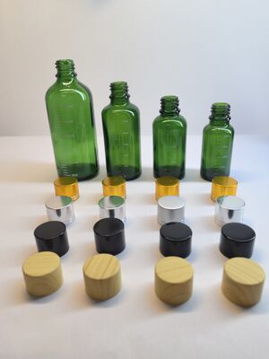 Premium Customizable Glass Essential Oil Bottles | 5ml-100ml Dropper Bottles with Multi-Material Caps & Scale Options